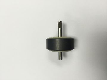 L'anello del magnete e l'asse del metallo inseriscono lo stampaggio ad iniezione con il legame della plastica